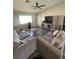 Open-concept living room with a ceiling fan and large sectional sofa at , Las Vegas, NV 89106