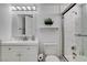 Clean bathroom with walk-in shower, white vanity, and modern fixtures at , Las Vegas, NV 89146