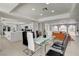 Bright dining room with glass table, seating for six, and an open floor plan with sightlines to the kitchen and living room at , Las Vegas, NV 89146