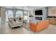 Bright living room with modern fireplace, complemented by large windows and stylish furnishings at , Las Vegas, NV 89146
