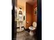 Charming half-bathroom featuring a pedestal sink and unique décor at 10403 Fancy Fern St, Las Vegas, NV 89183
