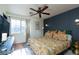 Comfortable bedroom with stylish accents, soft bedding, and a cozy, inviting atmosphere at 10403 Fancy Fern St, Las Vegas, NV 89183