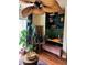Living room with a modern fan, accent plants, and hardwood flooring at 10403 Fancy Fern St, Las Vegas, NV 89183