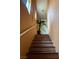 Bright staircase featuring decorative patterned risers and a sleek, modern handrail at 10403 Fancy Fern St, Las Vegas, NV 89183