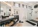 This bathroom boasts a modern vanity, vessel sink, and sleek walk-in shower, offering both style and convenience at 10408 Mezzanino Ct, Las Vegas, NV 89135