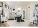 Bright bathroom showcases a luxurious black freestanding tub, walk-in shower, and elegant decor for a spa-like retreat at 10408 Mezzanino Ct, Las Vegas, NV 89135