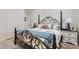 Bright bedroom features a comfortable bed, side tables, and cozy rugs, creating a welcoming retreat at 10408 Mezzanino Ct, Las Vegas, NV 89135