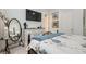 This bedroom features a comfortable queen bed, dresser, and calming decor, perfect for relaxing in style at 10408 Mezzanino Ct, Las Vegas, NV 89135