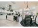 Open concept kitchen and dining area with modern appliances and comfortable seating at 10408 Mezzanino Ct, Las Vegas, NV 89135