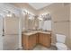 Bathroom with double sinks, granite countertop, and neutral walls at 10550 W Alexander Rd # 2233, Las Vegas, NV 89129