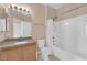 Bright bathroom with granite countertop and shower over tub combo at 10550 W Alexander Rd # 2233, Las Vegas, NV 89129
