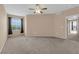 Bedroom with carpet, window with blinds, and neutral paint at 10550 W Alexander Rd # 2233, Las Vegas, NV 89129