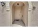 Charming entry with a decorative archway that leads to the front door of the residence at 10550 W Alexander Rd # 2233, Las Vegas, NV 89129