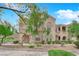 Charming three-story townhouse with lush landscaping in a well-maintained community at 10550 W Alexander Rd # 2233, Las Vegas, NV 89129