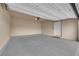 Clean garage with white ceiling and gray painted floor at 10550 W Alexander Rd # 2233, Las Vegas, NV 89129