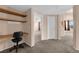 Home office featuring built-in shelves and desk space at 10550 W Alexander Rd # 2233, Las Vegas, NV 89129