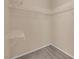 A walk-in closet with carpeted floors and white shelving at 10550 W Alexander Rd # 2233, Las Vegas, NV 89129