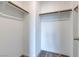 Walk-in closet with carpet, white walls, wood shelves, and space for organized storage and personal items at 10777 Briset Ct, Las Vegas, NV 89166