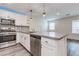 This kitchen features a breakfast bar, stainless steel appliances and recessed lighting at 10777 Briset Ct, Las Vegas, NV 89166
