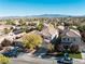Wide aerial view of neighborhood, displaying well-maintained houses and community layout at 11132 Ferragamo Ct, Las Vegas, NV 89141