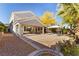 Large backyard featuring a covered patio, a spacious concrete pad, and minimal desert landscaping at 11132 Ferragamo Ct, Las Vegas, NV 89141