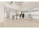 Bright and airy living space featuring soaring ceilings, modern finishes, and an open-concept kitchen at 12048 Portamento Ct, Las Vegas, NV 89138