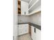 Walk-in pantry with built-in shelving and drawers for optimal organization at 12048 Portamento Ct, Las Vegas, NV 89138