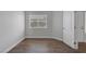 This room features a window that provides plenty of natural light, and has hardwood floors at 1213 Star Meadow Dr, North Las Vegas, NV 89030