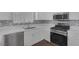 Updated kitchen showcases stainless steel appliances, sleek countertops, and ample natural light at 1213 Star Meadow Dr, North Las Vegas, NV 89030