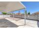 Covered patio featuring pavers, a concrete foundation, and a view of the neighborhood at 1213 Star Meadow Dr, North Las Vegas, NV 89030