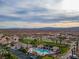 A desert community featuring meticulously cared for landscaping, a pool, tennis courts, and unobstructed desert views at 1223 Golf Club Dr, Laughlin, NV 89029