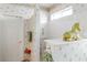 Bathroom featuring a shower area with built-in shelving and a pony wall at 1223 Golf Club Dr, Laughlin, NV 89029