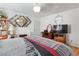 Inviting bedroom with a large mirror and vanity, complemented by a modern television for entertainment at 1223 Golf Club Dr, Laughlin, NV 89029