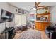 Inviting living room showcasing unique decor, a large flat-screen TV, and a cozy seating area at 1223 Golf Club Dr, Laughlin, NV 89029