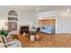 Bright living room with tile flooring, fireplace, cozy seating, and stylish decorative elements at 1223 Golf Club Dr, Laughlin, NV 89029