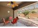 Covered patio with pergola and desert landscaping in the backyard at 1561 Campfire Ln, Mesquite, NV 89034