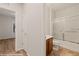 Bright bathroom featuring a shower-over-tub combo and a wooden vanity at 1561 Campfire Ln, Mesquite, NV 89034
