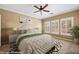Bedroom with a ceiling fan, natural light and neutral decor at 1561 Campfire Ln, Mesquite, NV 89034