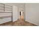 Bedroom with built-in shelves and attached door at 1561 Campfire Ln, Mesquite, NV 89034