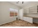 Bedroom with built-in shelves and storage at 1561 Campfire Ln, Mesquite, NV 89034