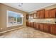 Cozy breakfast nook featuring a view through plantation shutters and ample storage at 1561 Campfire Ln, Mesquite, NV 89034