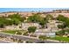 Scenic view of the Sun City Mesquite entrance with waterfalls and lush landscaping at 1561 Campfire Ln, Mesquite, NV 89034