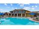 Resort-style pool with lounge area, ideal for relaxation and leisure in the community at 1561 Campfire Ln, Mesquite, NV 89034