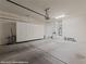 Spacious two-car garage with white cabinets for organized storage solutions at 1561 Campfire Ln, Mesquite, NV 89034