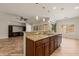 Gourmet kitchen with stainless steel appliances and granite island at 1561 Campfire Ln, Mesquite, NV 89034