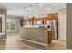 Stylish kitchen boasting granite countertops, stainless steel appliances, and a convenient island for cooking and dining at 1561 Campfire Ln, Mesquite, NV 89034