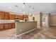 Open kitchen with an island, granite countertops, and a view into the living area creating a great flow at 1561 Campfire Ln, Mesquite, NV 89034
