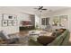 Cozy living room with stylish furniture, modern decor, and large windows at 1561 Campfire Ln, Mesquite, NV 89034