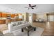 Open-concept living area features a kitchen with bar seating and ample space at 1561 Campfire Ln, Mesquite, NV 89034