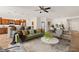 Open-concept living space with a kitchen, dining area, and modern furniture at 1561 Campfire Ln, Mesquite, NV 89034